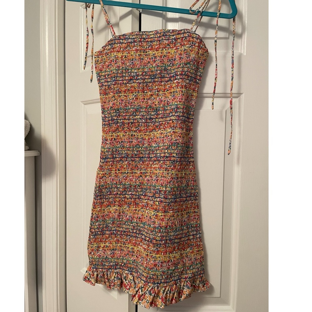 Multicolored smocked dress with ruffle and ties